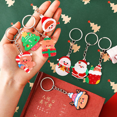 透明なアクリルと金属の付着物と クリスマススノーマンキーリング